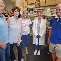 Five people visiting the Waters Lab