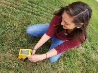 mph-student-devin-knutson-using-xrf-equipment-to-measure-lead-levels-in-soil mph-student-devin-knutson-using-xrf-equipment-to-measure-lead-levels-in-soil