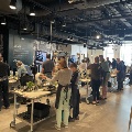 group of people cooking during the food as medicine series at the create culinary studio at the cincinnati museum center