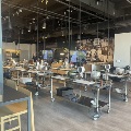 group of people cooking during the food as medicine series at the create culinary studio at the cincinnati museum center