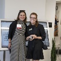 Two women post