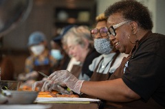 centering medical visit participants cooking a healthy meal