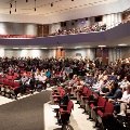 students sitting in an auditorium
