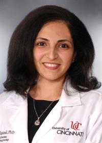 Elgamal Ola with UC lab coat Elgamal Ola