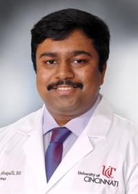 Krothapalli Krishna with UC lab coat Photo of Krothapalli Krishna
