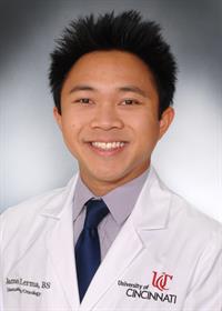 Lerma James Photo of Lerma James in UC lab coat