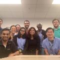 Residents standing in the lab with Dr. Sharma