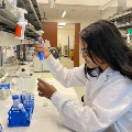 Afra working in the lab